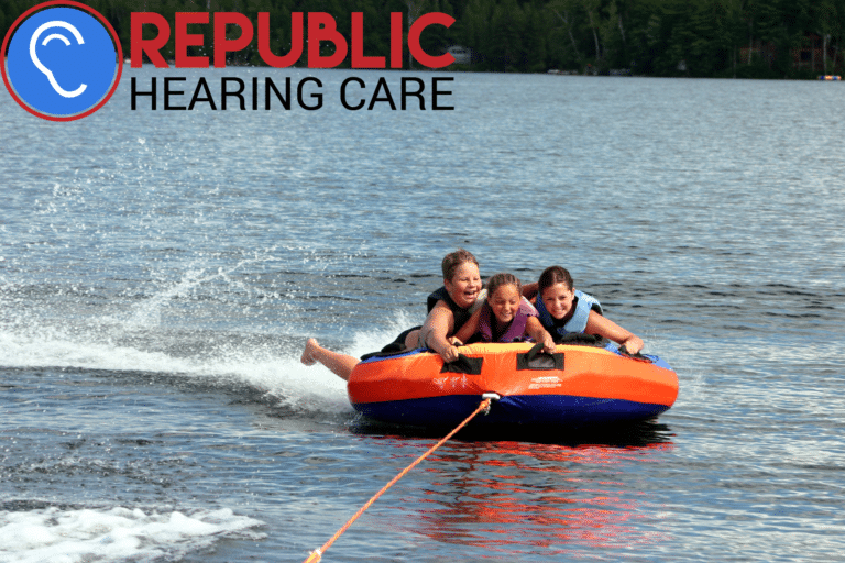 kids tubing on a lake