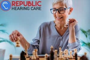 older woman playing chess