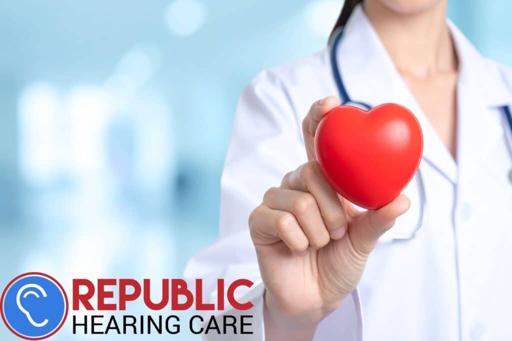 doctor holding a red heart