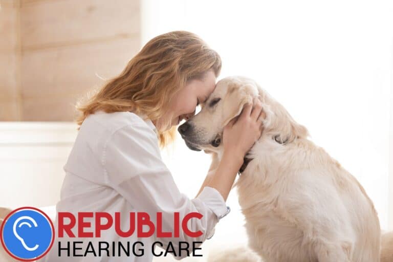 woman petting her dog